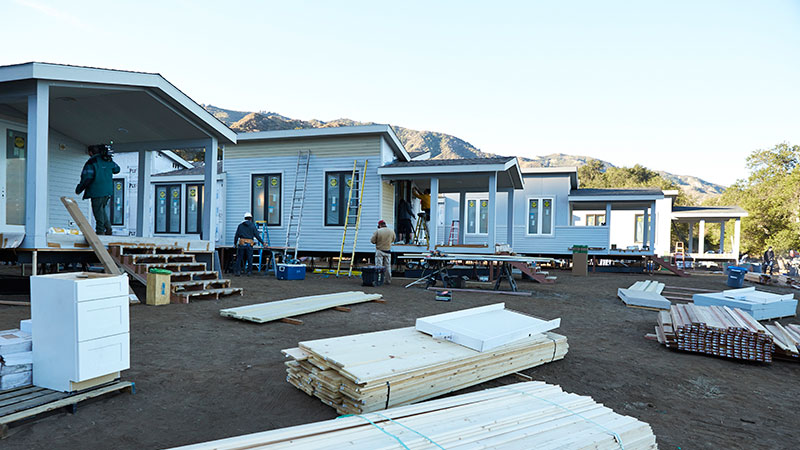 Cavco and Palm Harbor's modular Eco-cottages being set up for NBC's American Dream Builders